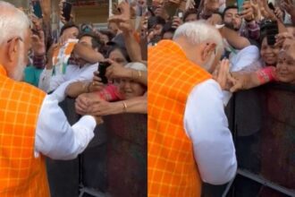 PM Modi came out after voting, an elderly woman standing in the crowd tied Rakhi, watch video - India TV Hindi