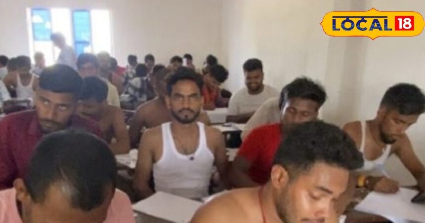 Oh heat! Students giving graduation exam are in a bad state, they took off their shirts and gave the exam