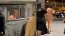 Peculiar: The woman was seen walking at the airport without clothes, the policemen tried to cover up