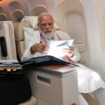 PM Modi posted a photo of him working in a plane, fans went crazy