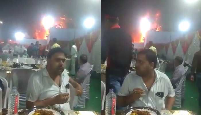 Because the hunger of the stomach is bigger than the fire!  watch viral video