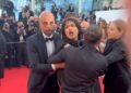 Topless Ukraines Woman Protest On Cannes Red Carpet, 'stop raping us' painted on her body - On the red carpet of Cannes Film Festival, Ukrainian woman came topless and shouted - Stop raping us...