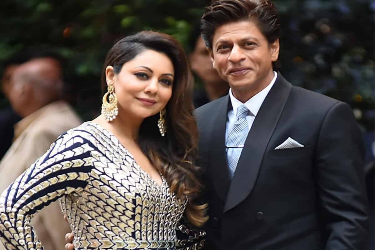 On the very next day of marriage, why did Shahrukh tell Gauri in a packed gathering, 'Go wear a burqa'