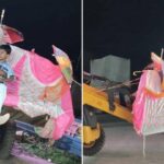 The groom reached to get married riding on a bulldozer