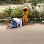 To ask for votes from the girl students, someone held the feet and some did bow down;  Watch this funny video, Somebody held the feet to ask for votes from the girl students and some did bow down;  watch this funny video