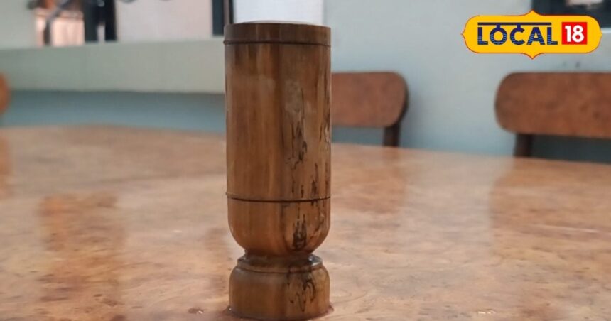 Drink water in this wooden glass. Bones will become strong like iron, you will never be obese, BP will run away.
