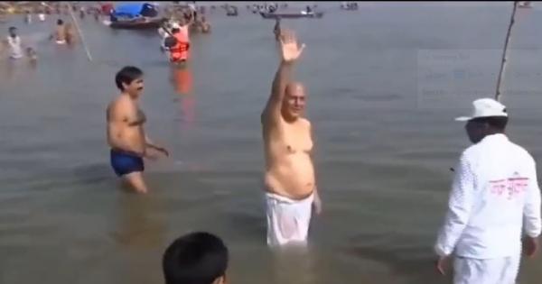 Defense Minister Rajnath Singh took a dip of faith in the holy Sangam