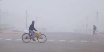 Biting cold and fog hit Delhi for the third consecutive day. Many flights and trains delayed.