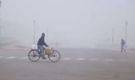 Biting cold and fog hit Delhi for the third consecutive day. Many flights and trains delayed.