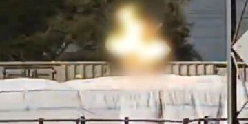 Man climbs on roof of train, clings to 11KV live wire, explodes in a ball of fire; VIDEO - India TV Hindi