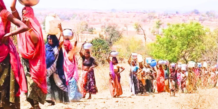 No water, not a bride, people craving close to drop near the dam, the feet have to burn to quench thirst