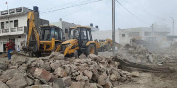 Bulldozer went on the cemetery in Bharatpur, broke the wall and removed