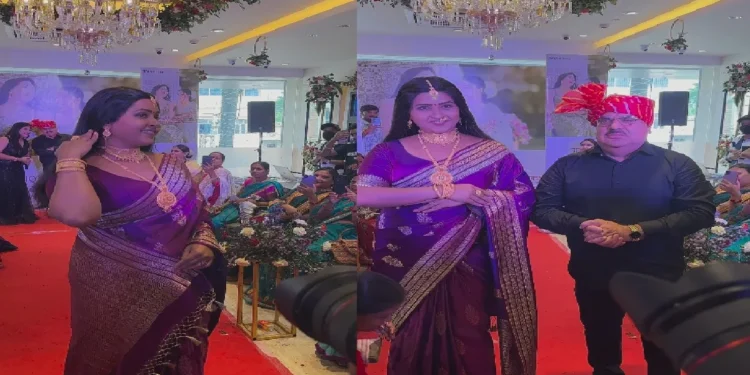Kajal Raghwani wearing a porple saree and a lot of gold walked the ramp, crowded to see