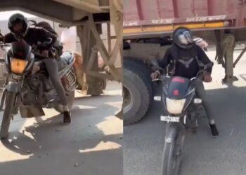 What a hurry! A person came out with a bike from under a moving truck, after watching the video people said - 'Only such people are loved by God...'