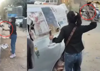 Wife angry with her husband created a ruckus on the road, broke all the glass of the car one by one, VIDEO goes viral