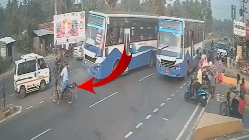 Had to cross the road without looking and was hit hard by a heavy, speeding bus; Watch shocking video