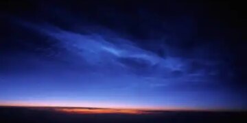 Mysterious 'noctilucent clouds' glowing at night, spread light even after sunset