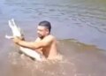 Surprising sight in the river: Girl seen caressing crocodile, video goes viral on internet