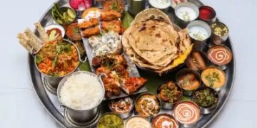 There is no change in the price of home-made vegetarian thali in February, non-vegetarian thali is 3 percent cheaper.
