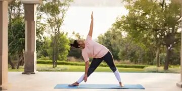 Trikonasana strengthens digestion along with relieving stress, beneficial for those who work sitting for long hours.