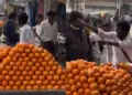 Unique video of a young man selling oranges goes viral, creates uproar due to his strange style and actions