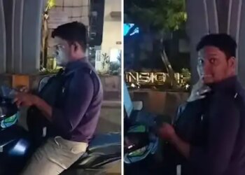 Video of a person working on a laptop in traffic at 12 o'clock in the night goes viral, users say - 'God, don't ever make someone with a corporate job...'