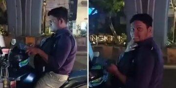 Video of a person working on a laptop in traffic at 12 o'clock in the night goes viral, users say - 'God, don't ever make someone with a corporate job...'