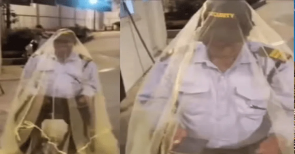 Viral video of security guard in Hyderabad, sitting inside mosquito net and doing duty all night, people got emotional