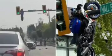 Road accident in Canada: Due to collision with car, bike bounces and hangs on traffic signal pole, video goes viral
