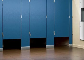 Why is there a gap below the toilet doors of cinema halls and shopping malls?