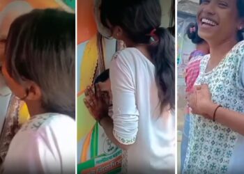 Girl performs obscene act with PM Modi's poster? Kissing video from Bengal goes viral!