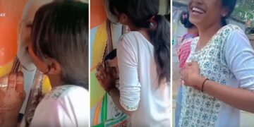 Girl performs obscene act with PM Modi's poster? Kissing video from Bengal goes viral!